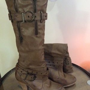 Tall distressed leather boot